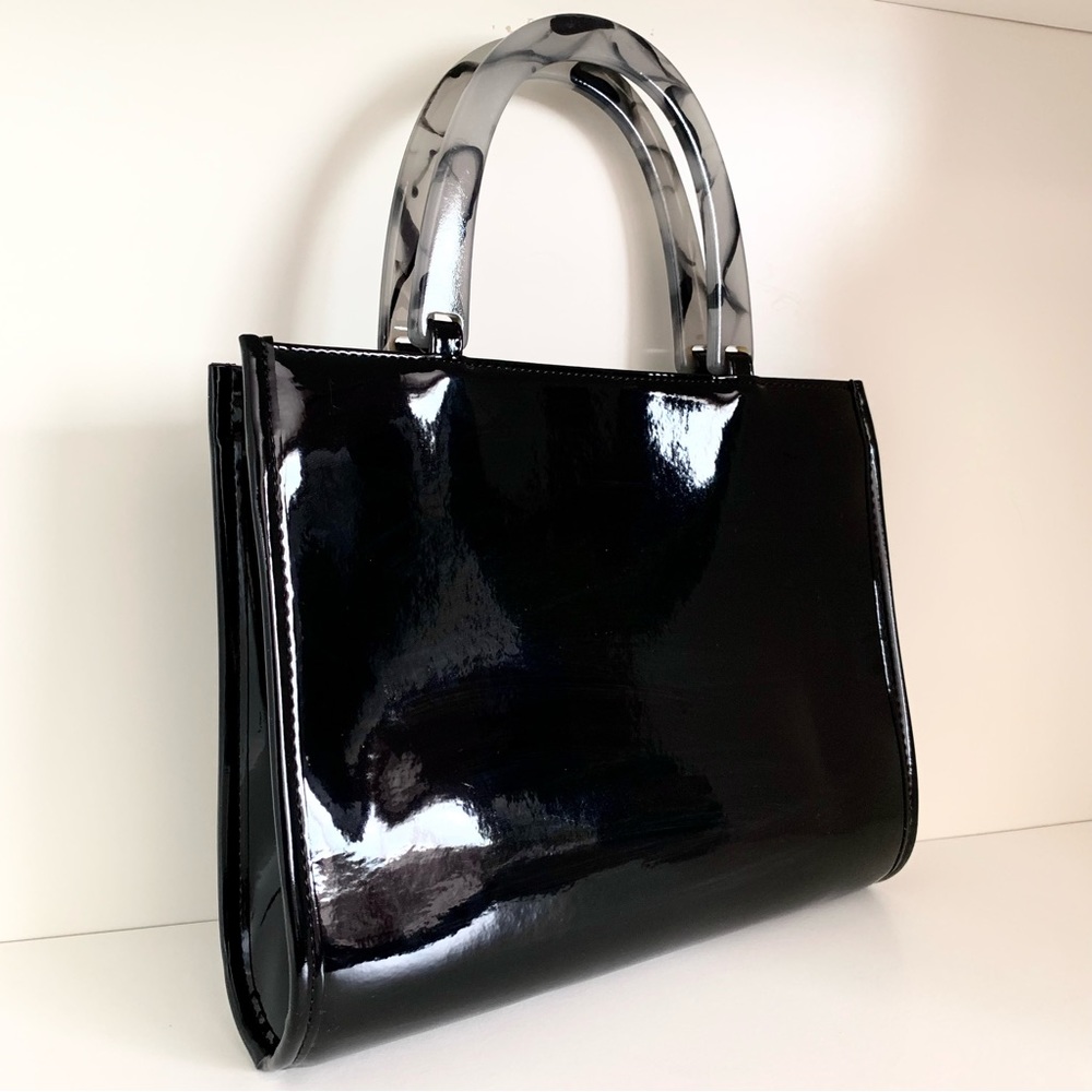 Hold NWOT Neiman Marcus black patent marble handle modern bag